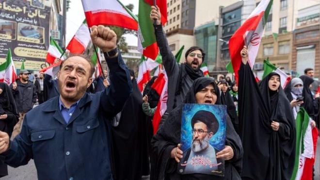 Iran threatens to block more trade routes as US launches fresh strikes